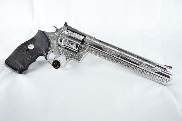 Right Side of Hand Engraved snake gun