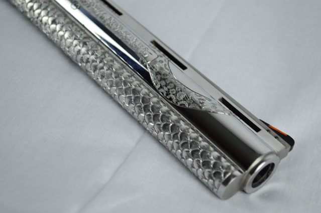 Here is a view of the Hand Engraved barrel with snake scales and a snake