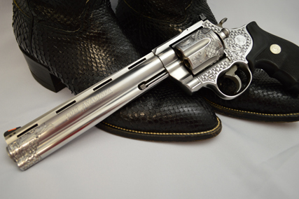 Photo of Colt Anaconda with a Boot